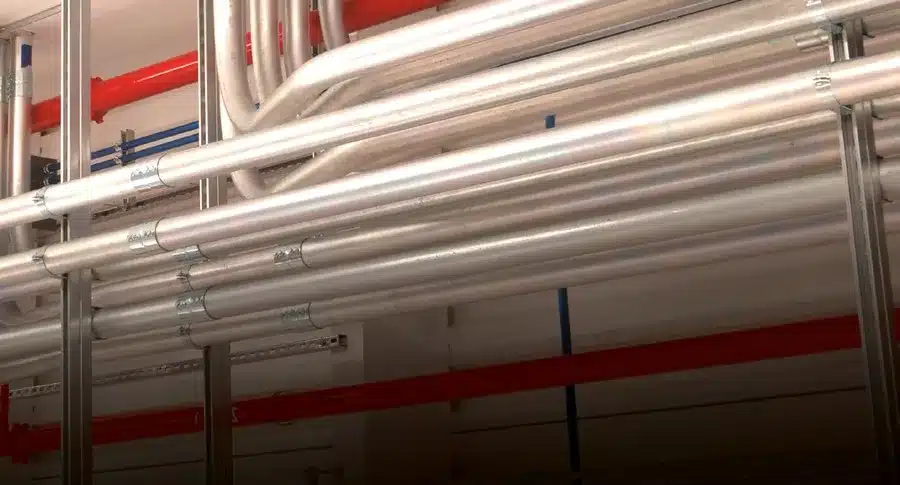 EMT conduit runs installed overhead with setscrew couplings